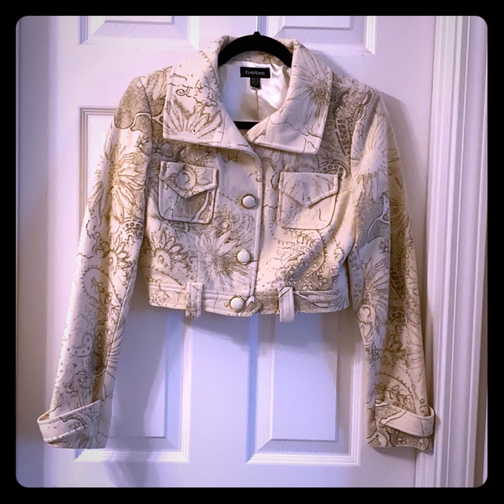 Bebe crop coat with ivory and gold buttons.